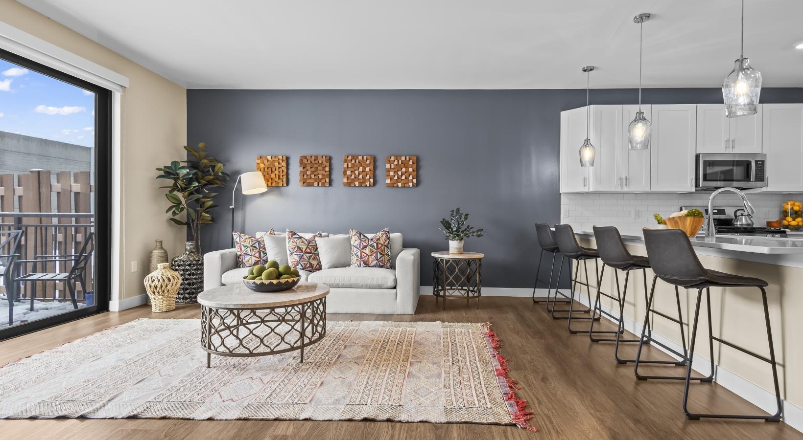 a living room with a large rug