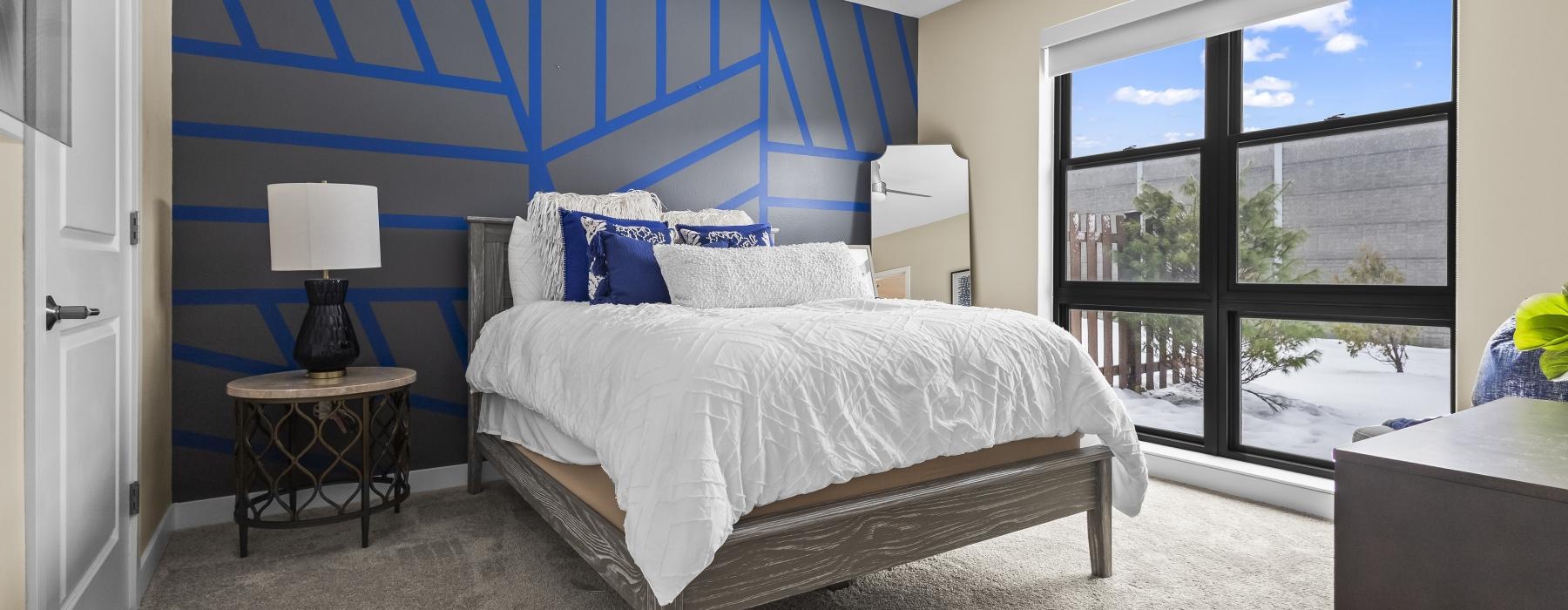 a bedroom with a large bed